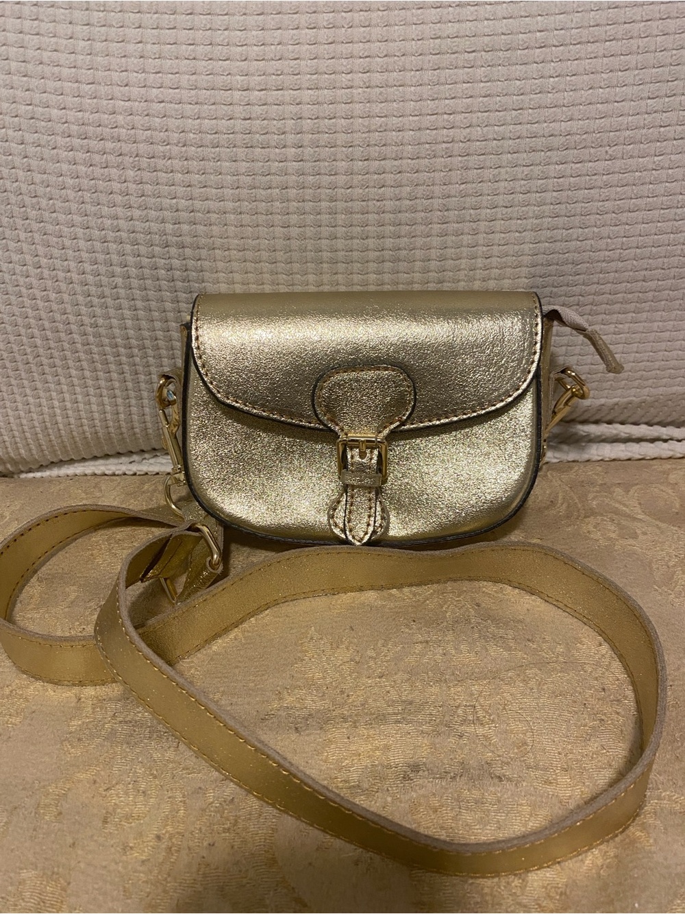 Metallic Gold Mini Saddle Crossbody Bag with Buckle Detail